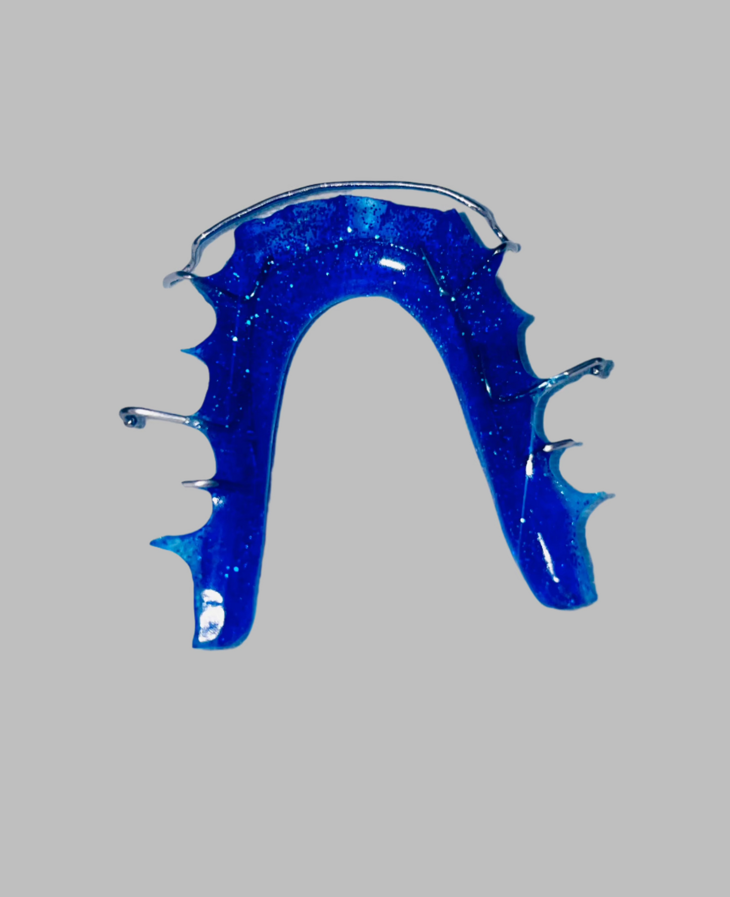 "Blue acrylic Hawley retainer with stainless steel wire"