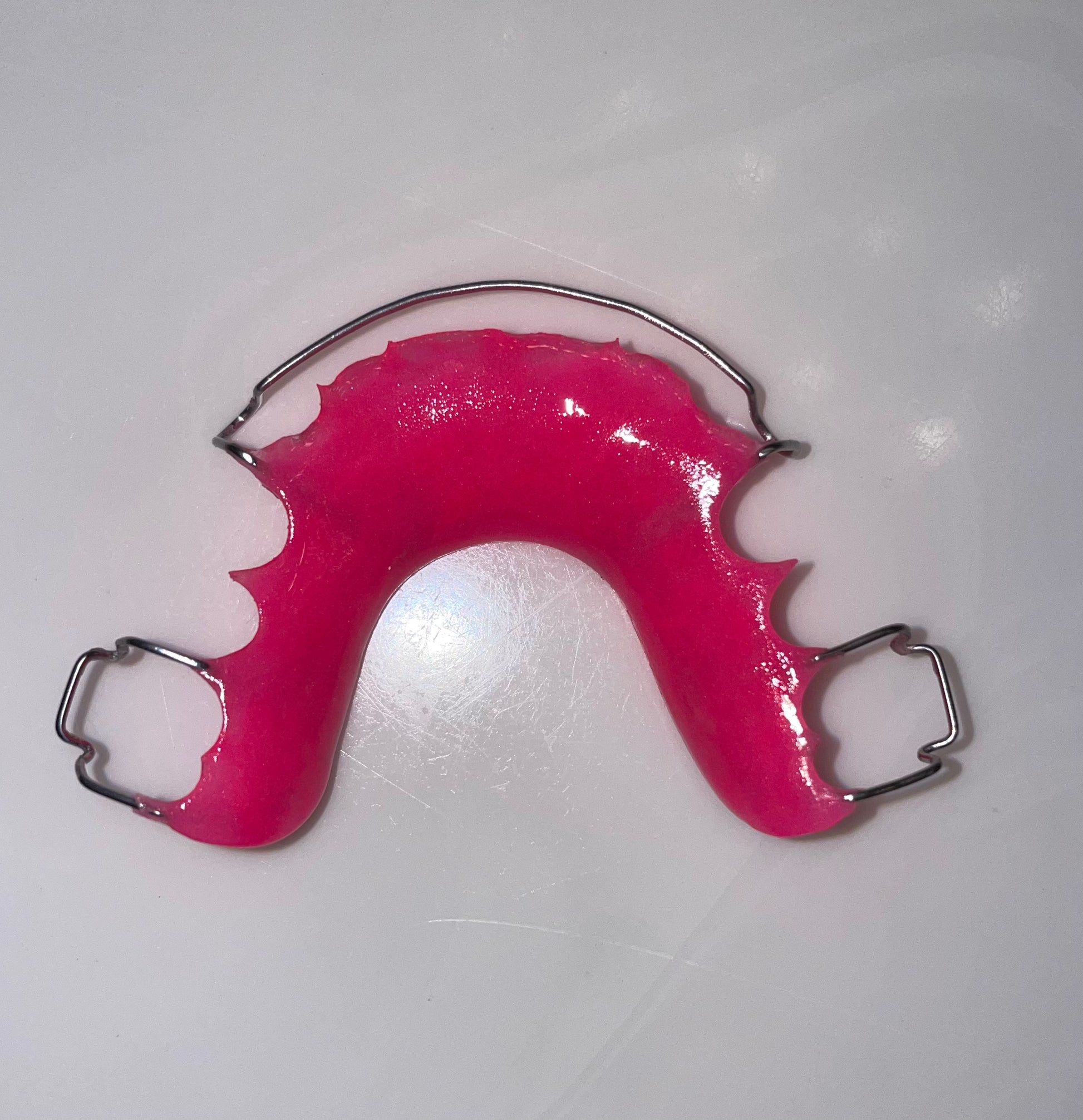 Upper Hot Pink Hawley Retainer, Custom Hawley retainer to retain teeth. 