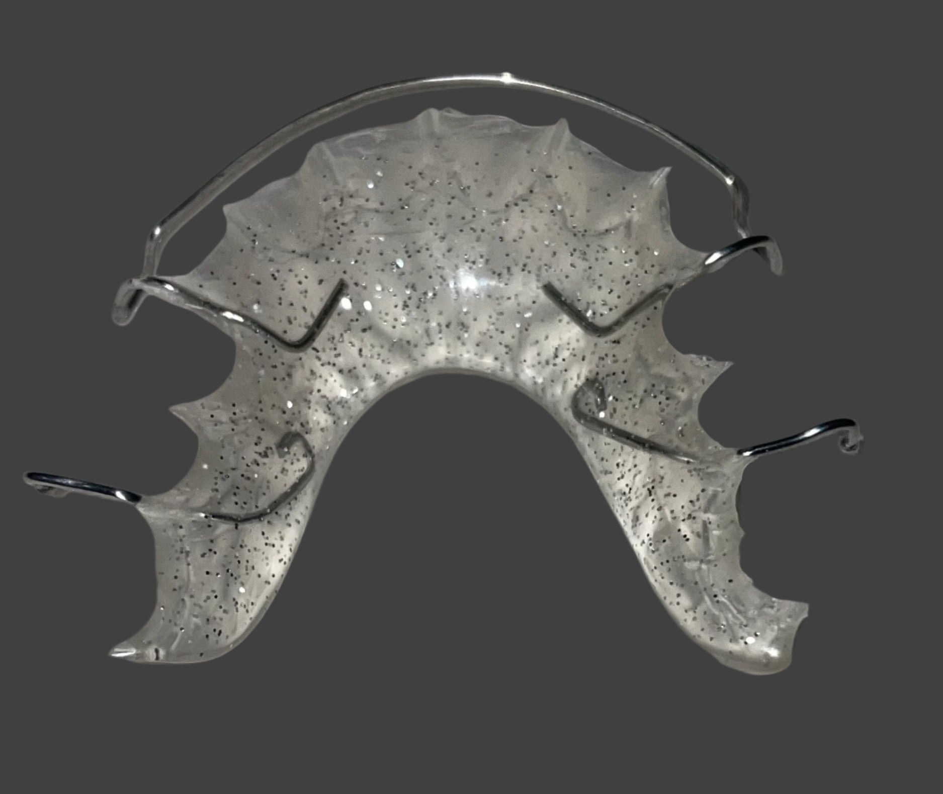 "Close-up of stainless steel wire on Hawley retainer"
